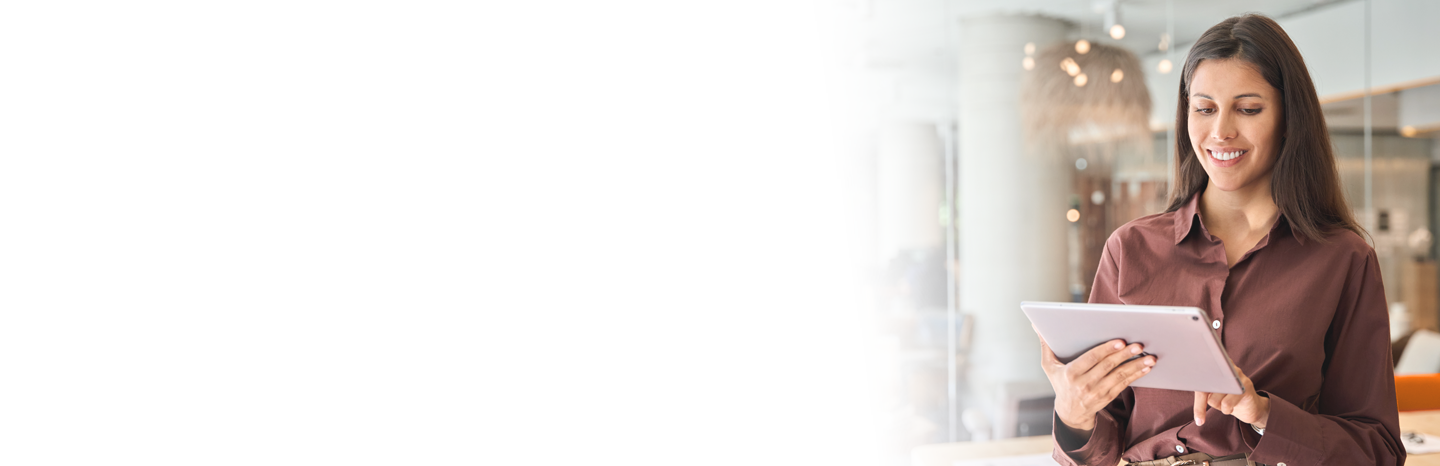 Young woman using a tablet in a classroom